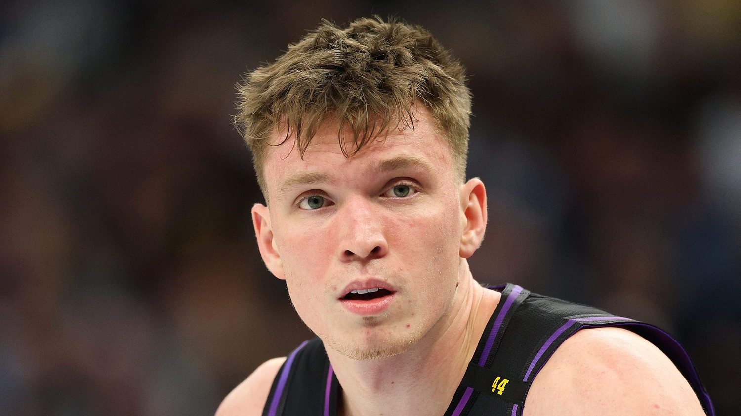 Close-up of Dalton Knecht in a purple and black Lakers jersey.