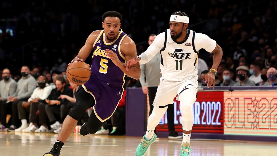 Talen Horton Tucker guarded by Mike Conley